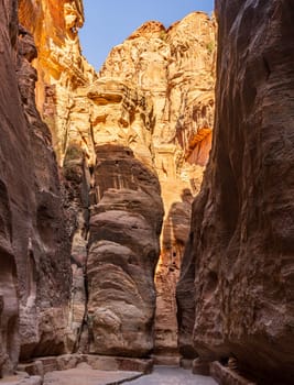 Water channels carved on both sides of the narrow gorge of the Siq entering Petra in Jordan