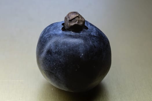 delicious blueberry with sharp pepper grain  in close up