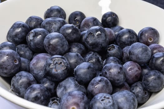 delicious blueberry with ripe fruit in close up