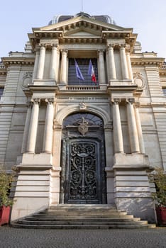 France, Paris - May 03, 2025 - Exterior architectural design of The Paris Chamber of Commerce and Industry building (Chambre de commerce de Paris) is a French chamber of commerce that supports businesses in Paris and the ile-de-France region. It located at Friedland avenu, use it as your Wallpaper, Poster and Copy space, Selective focus.