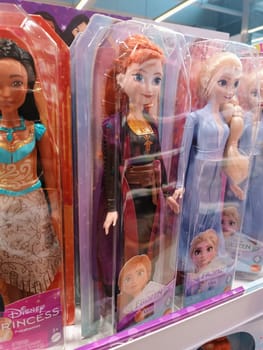 Gdansk, Poland - 14 May 2025: Elsa, Anna, Mulan Disney princesses toy dolls buy parents present barbies on shop shelves International Children's Day 2025 1 June kids game play . High quality photo