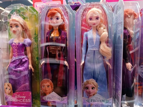 Gdansk, Poland - 14 May 2025: Elsa, Anna, Rapunzel Disney princesses toy dolls buy parents present barbies on shop shelves International Children's Day 2025 1 June kids game play . High quality photo