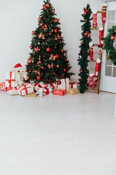 Christmas Tree with Gifts and Toys Decorated for New Year