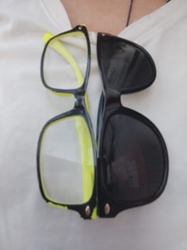 Glasses layered shirt objects white glasses healthy . High quality photo