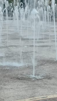 Water fountains splashing street building architecture travel shotlisttravel place destination objects city centre town nature park summer vertical place destination objects . High quality photo