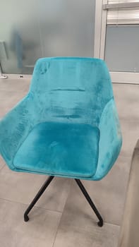Turquoise velvet chair design decor furniture building restoration object blue one isolated home hotel apartment wooden room indoor . High quality photo