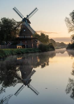 Hengstforder mill close to Bad Zwischenahn on a foggy morning, Lower Saxony, Germany