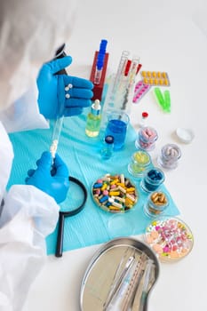 examine drugs in the laboratory. Selective focus. pills.