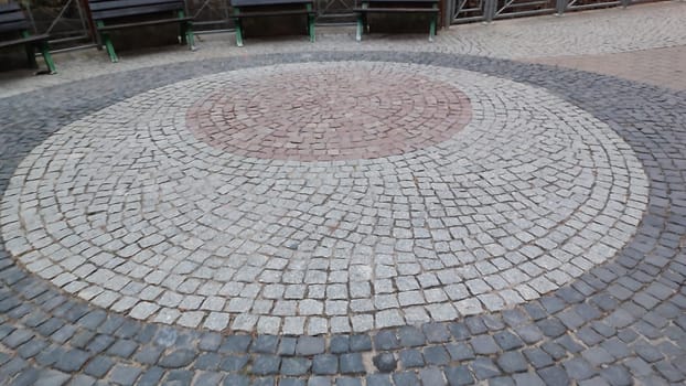 Circular cobblestone pattern round construction building architecture street city background landmark stone material products . High quality photo outdoor texture