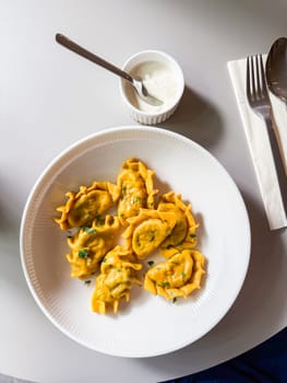 Homemade dumplings on a quiet afternoon. Cultural comfort food and lunchtime stillness.