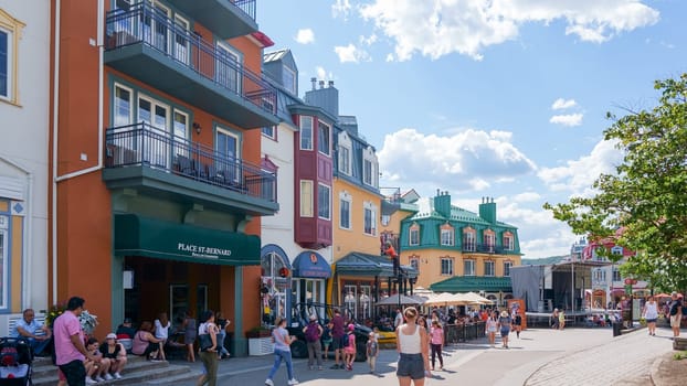 Mont-Tremblant QC Canada - 22.09.2024: A Lively And Vibrant Village Street Scene With Tourists, Local Shops And Restaurants To Explore.