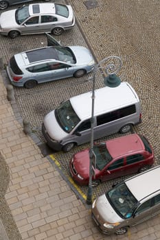 Karlovy Vary, Czech Republic – April 20, 2025: Public parking lot at the river Tepla in the city center of Karlovy Vary in the Czech Republic seen from above
