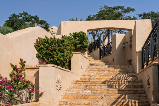 Stone staircase in modern tourist resort hotel leading back from the Dead Sea