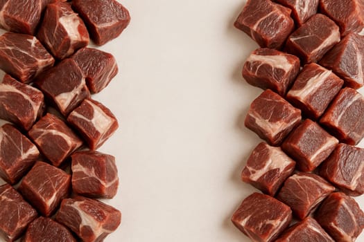 AI generated overhead shot of premium fresh wild boar meat cut into rustic chunks from various cuts arranged artfully showcasing vibrant natural colors against clean white space