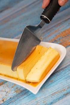 Cream caramel pudding with caramel sauce on a plate, Flan, High quality photo