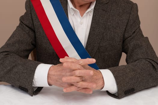 Mayor in France congratulates newlyweds French red blue white ribbon
