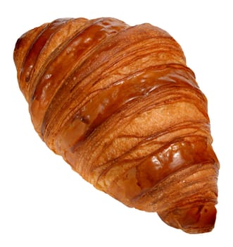 Brown croissant with a glossy surface. Isolated background