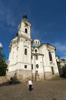 Karlovy Vary, Czech Republic – April 20, 2025: The baroque church of St. Mary Magdalene in the old town of Karlovy Vary in the Czech Republic