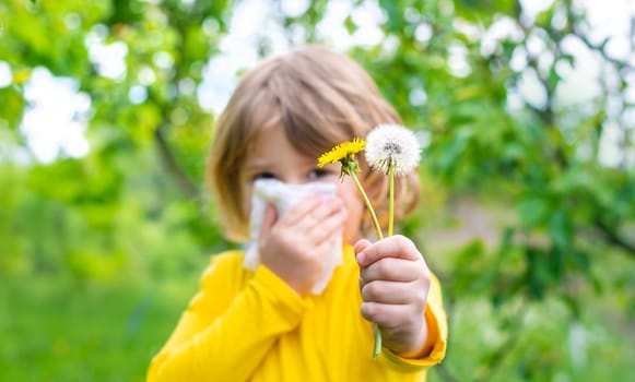The child is allergic to dandelions. Selective focus. Kid.