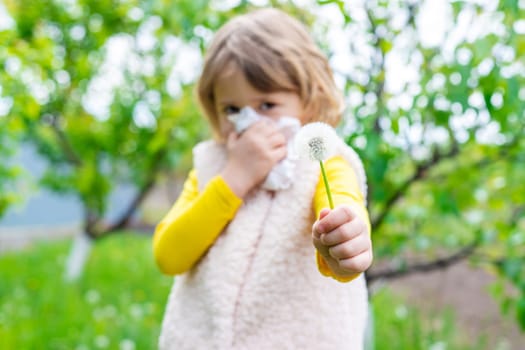 The child is allergic to dandelions. Selective focus. Kid.