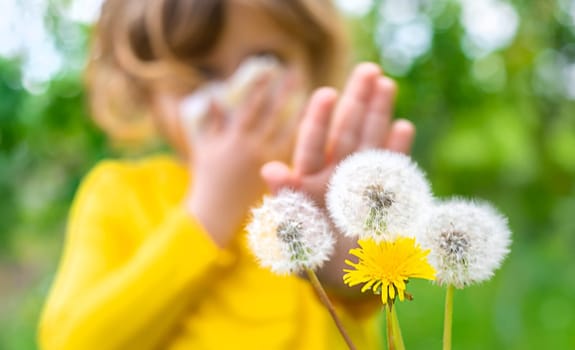 The child is allergic to dandelions. Selective focus. Kid.
