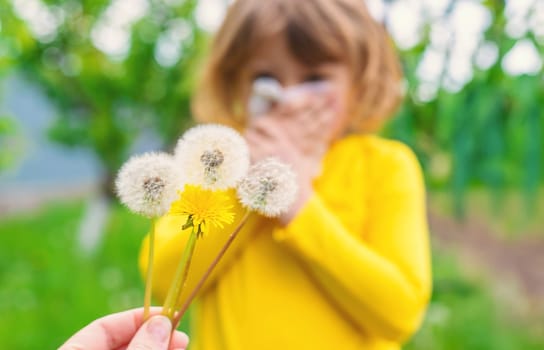 The child is allergic to dandelions. Selective focus. Kid.
