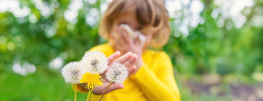 The child is allergic to dandelions. Selective focus. Kid.