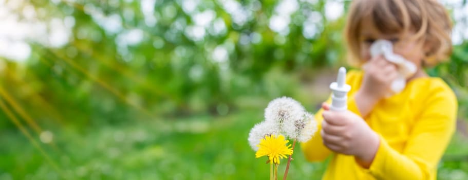 The child is allergic to dandelions. Selective focus. Kid.