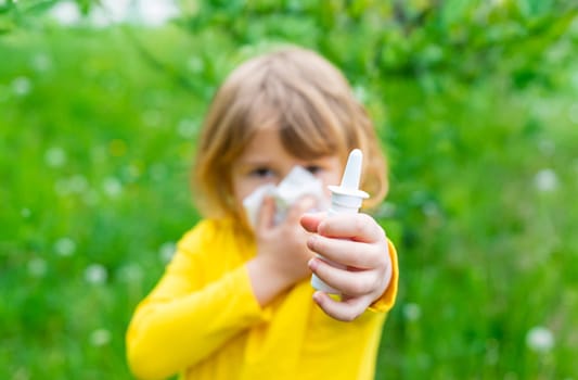 The child is allergic to dandelions. Selective focus. Kid.