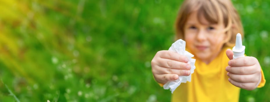 The child is allergic to dandelions. Selective focus. Kid.