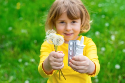 The child is allergic to dandelions. Selective focus. Kid.