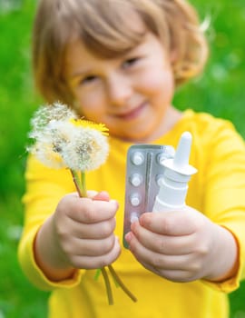 The child is allergic to dandelions. Selective focus. Kid.