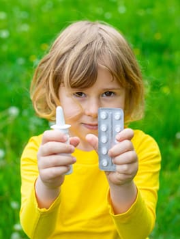 The child is allergic to dandelions. Selective focus. Kid.