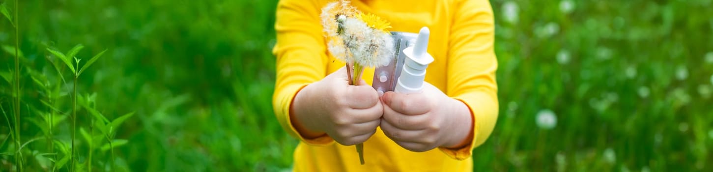 The child is allergic to dandelions. Selective focus. Kid.