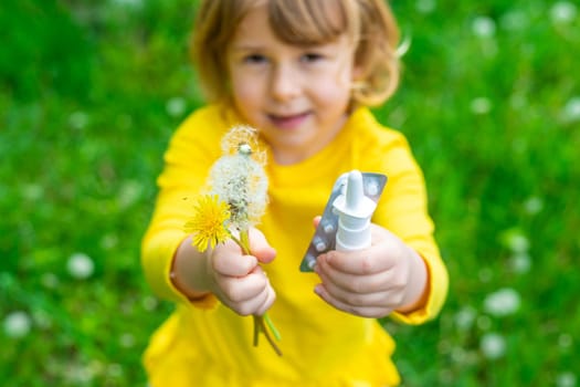 The child is allergic to dandelions. Selective focus. Kid.