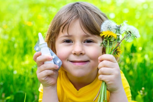 The child is allergic to dandelions. Selective focus. Kid.