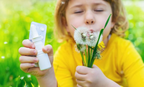 The child is allergic to dandelions. Selective focus. Kid.