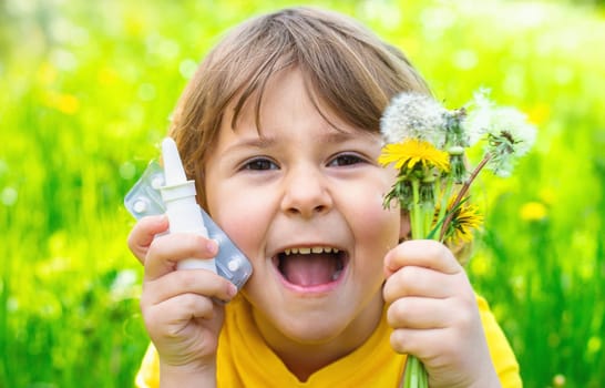 The child is allergic to dandelions. Selective focus. Kid.