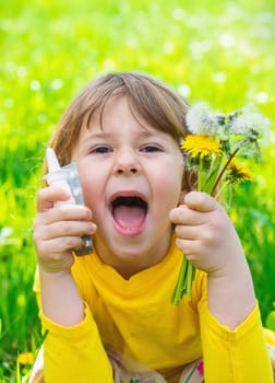The child is allergic to dandelions. Selective focus. Kid.