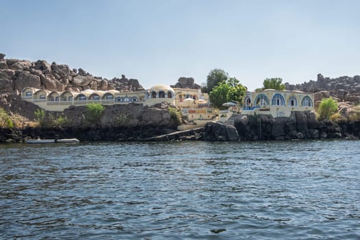 Aswan, Egypt - 5 November 2024: Old Nubian Guesthouse hotel near the Old Aswan dam and Philae Temple