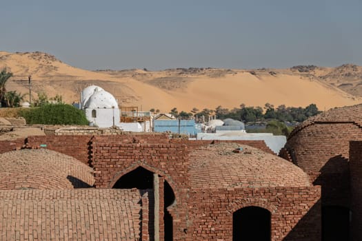 Traditional brick barrel ceiling and domed roofs on Nubian homes in Aswan, Egypt