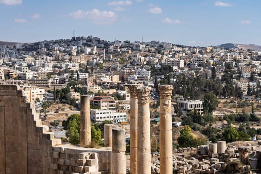 View down colonaded path towards the modern city in Jerash, a Greco-Roman well preserved city in Jordan