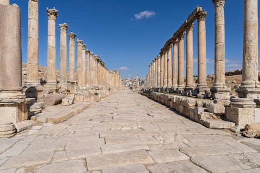 Columns line the Cardo Maximus, the main street to North Gate in Jerash, a Greco-Roman well preserved city in Jordan