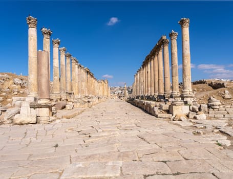 Columns line the Cardo Maximus, the main street to North Gate in Jerash, a Greco-Roman well preserved city in Jordan