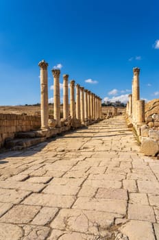 Columns line the Decumanus, the second street in Jerash, a Greco-Roman well preserved city in Jordan