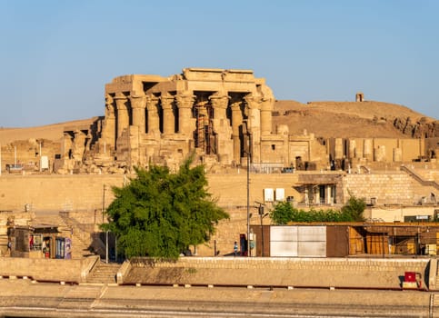 Kom Ombo, Egypt - 5 November 2024: Magnificent temple of Sobek and Horus stands above the River Nile at Kom Ombo