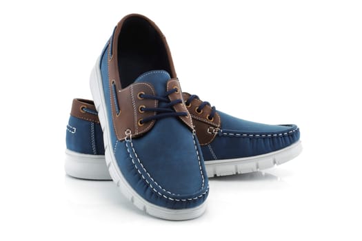 A pair of blue men's shoes on white background