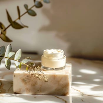 Cosmetic cream in a glass jar. Skin care concept. Background for beauty products