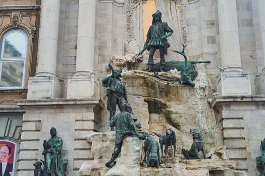 Hungary, Budapest - 04.10.2022: A striking bronze monument featuring historical figures and animals, showcasing artistic craftsmanship.