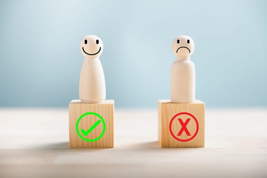 Wooden block choice, people display right and wrong contemplating yes or no. Business dilemma depicted by true and false symbols on wood. Decision-making concept shown. Think With Yes Or No Choice.